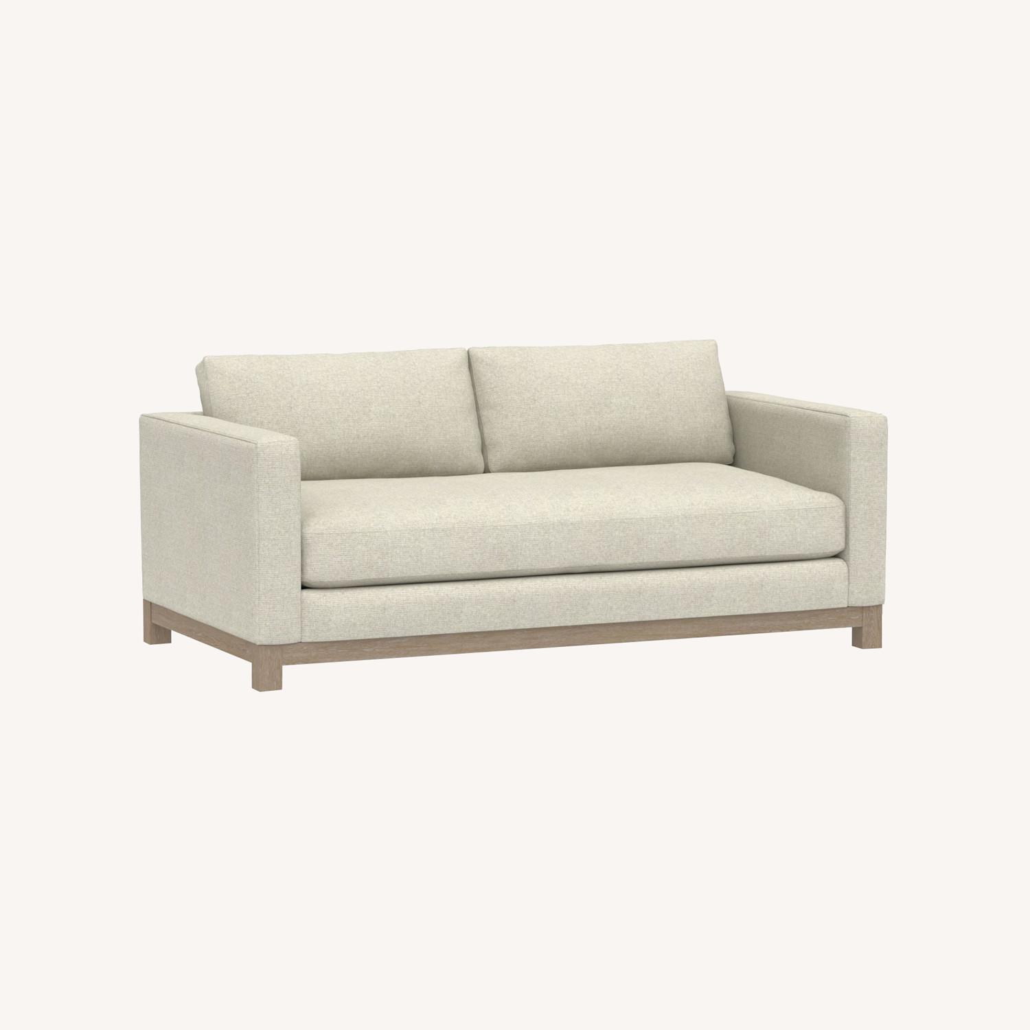 Pottery Barn Jake Upholstered Sofa with Wood Base - image-0
