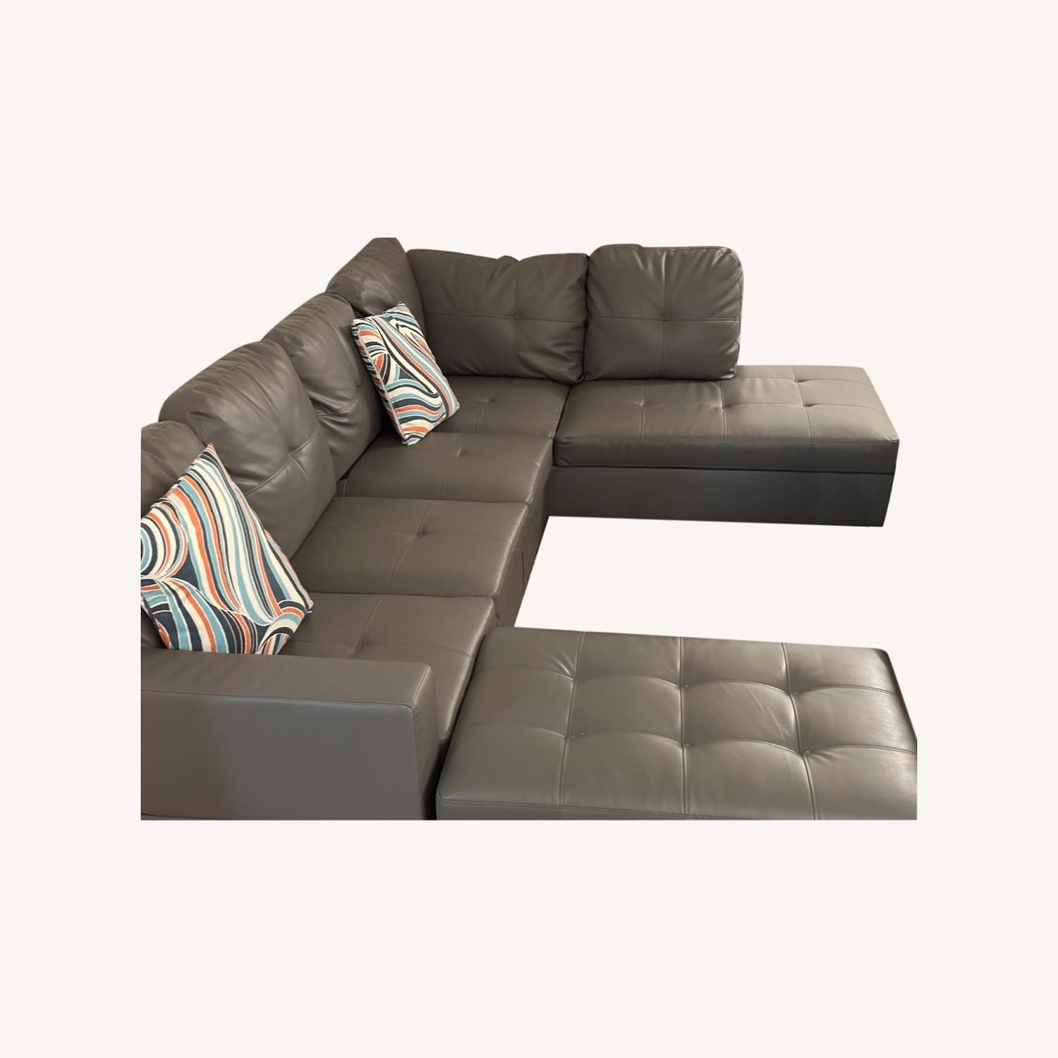 Two Piece Sectional w Ottoman + Storage - image-0