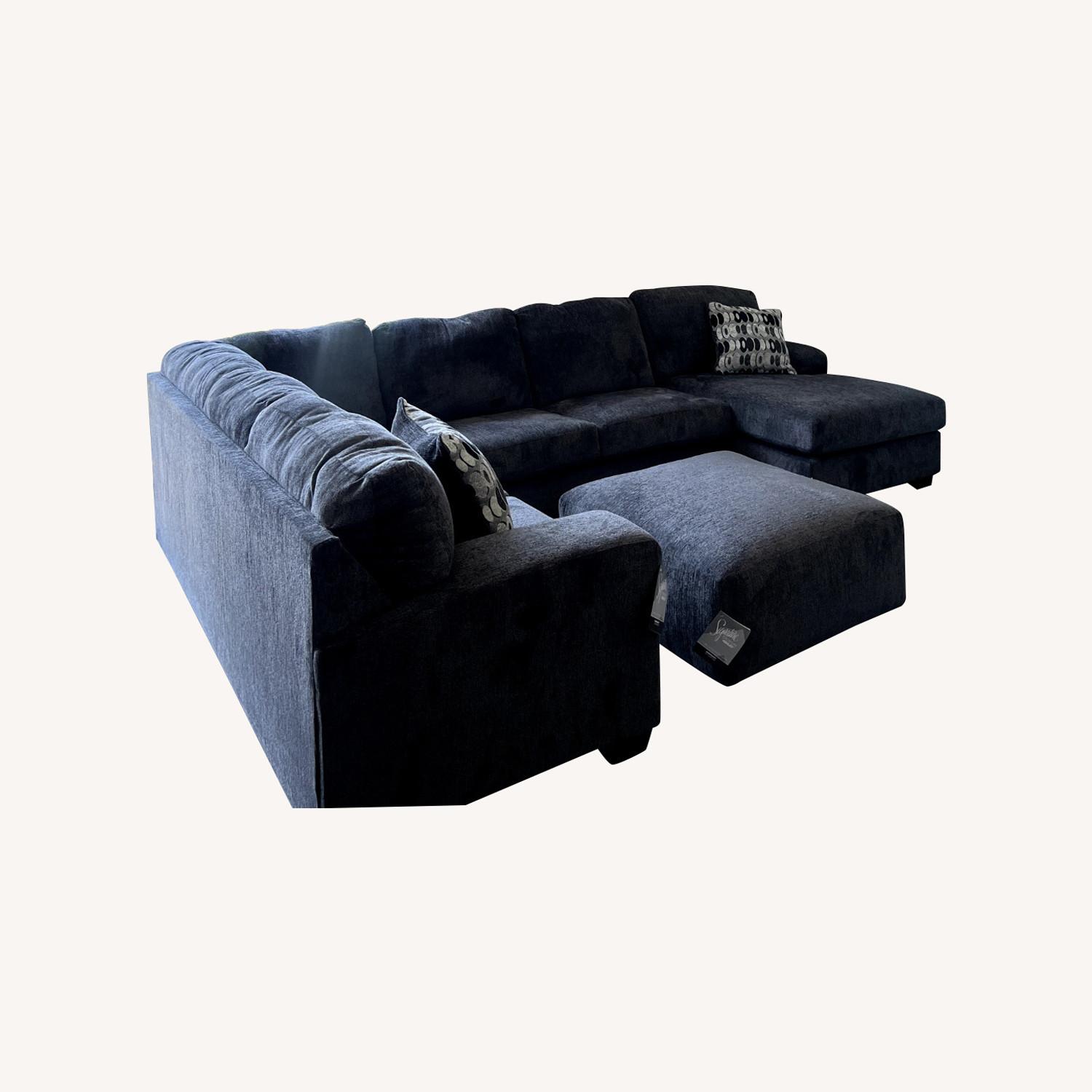 Ashley Furniture Contemporary Sofa with Protection Included - image-0