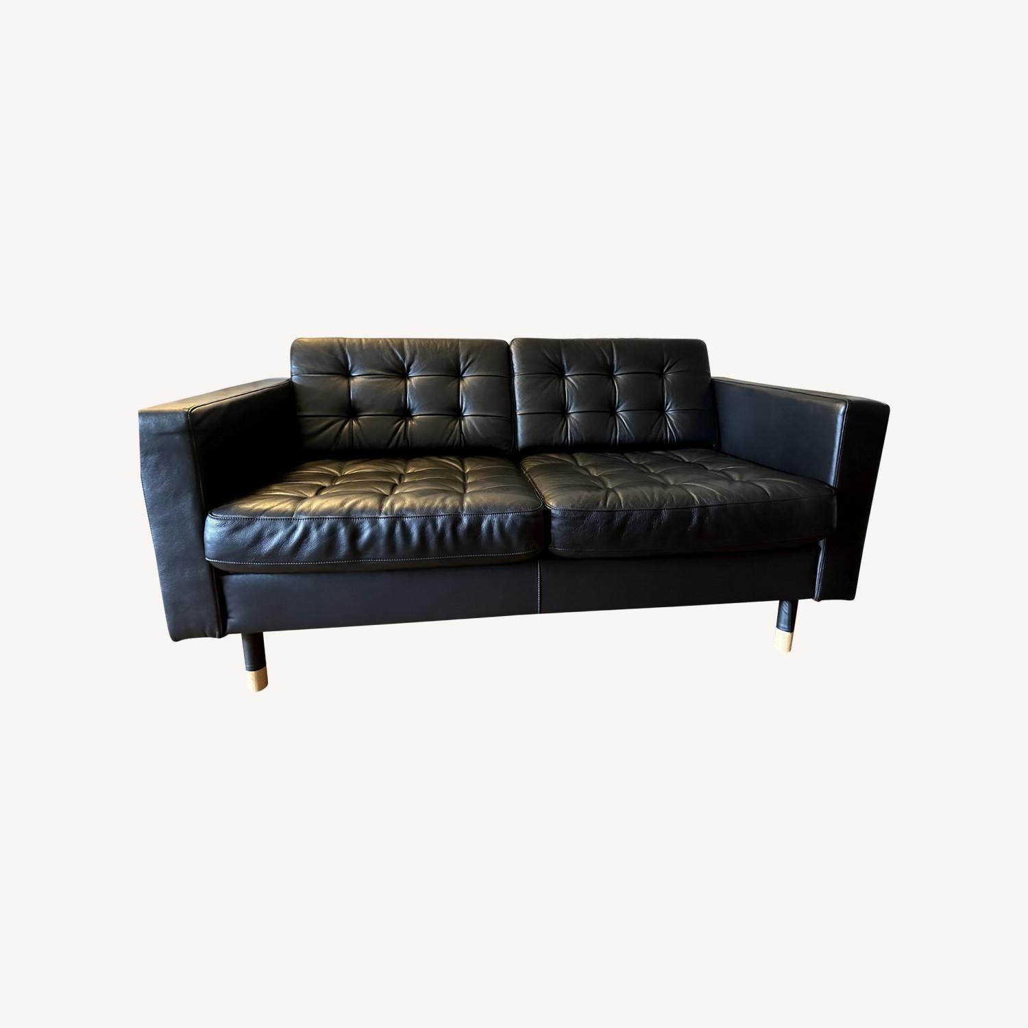 IKEA Black Leather Morabo Loveseat Wood Legs - image-0