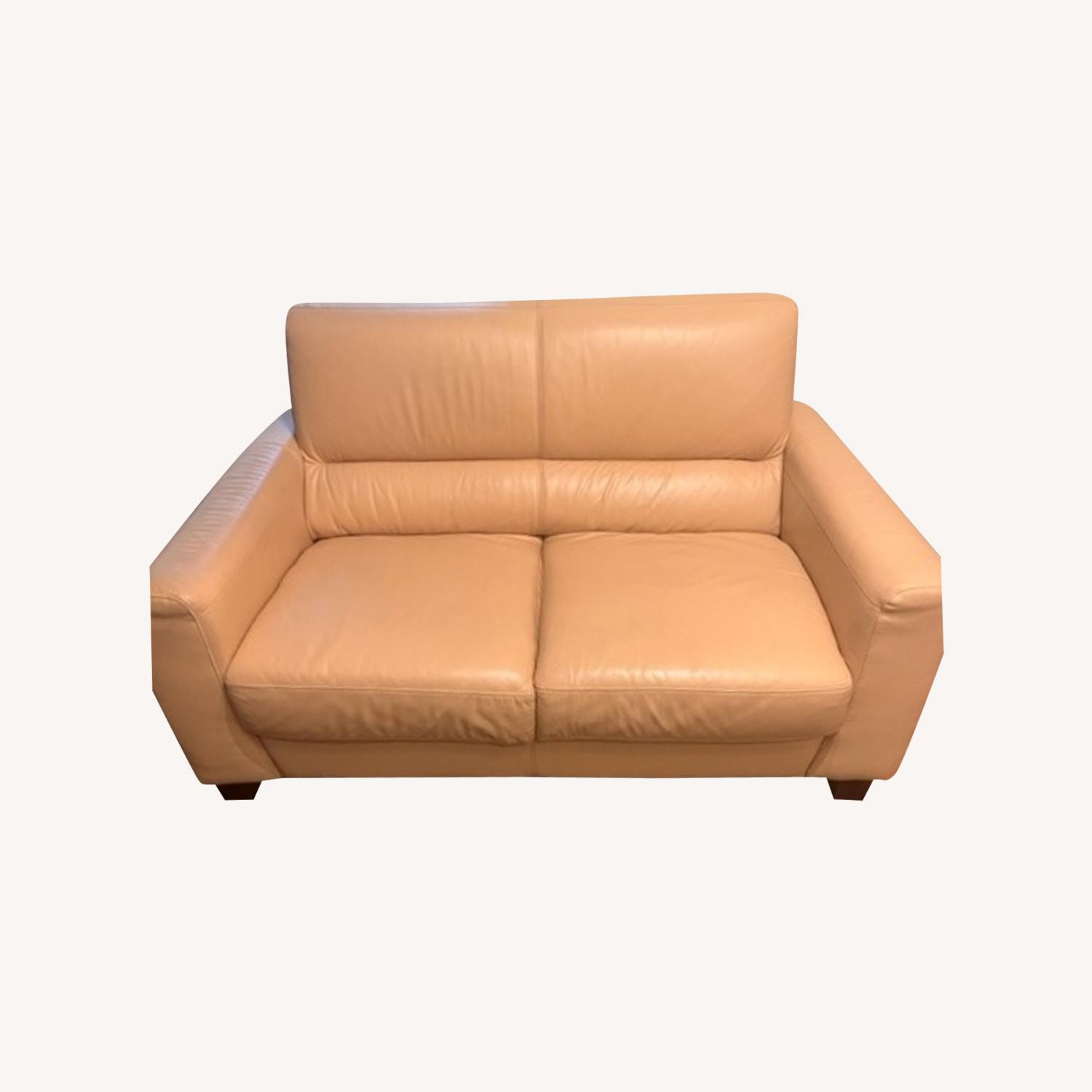 Light Yellow Leather Loveseat - image-0