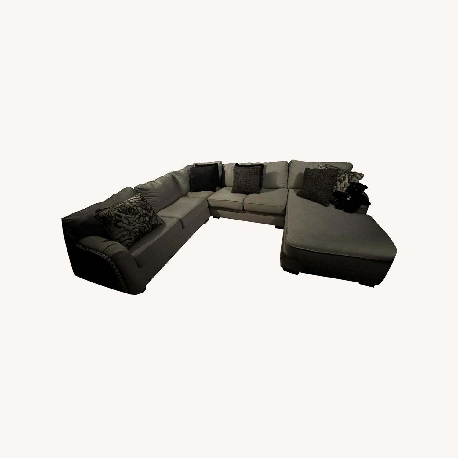 Ashley Furniture 4-Piece U-Shaped Sectional - image-0