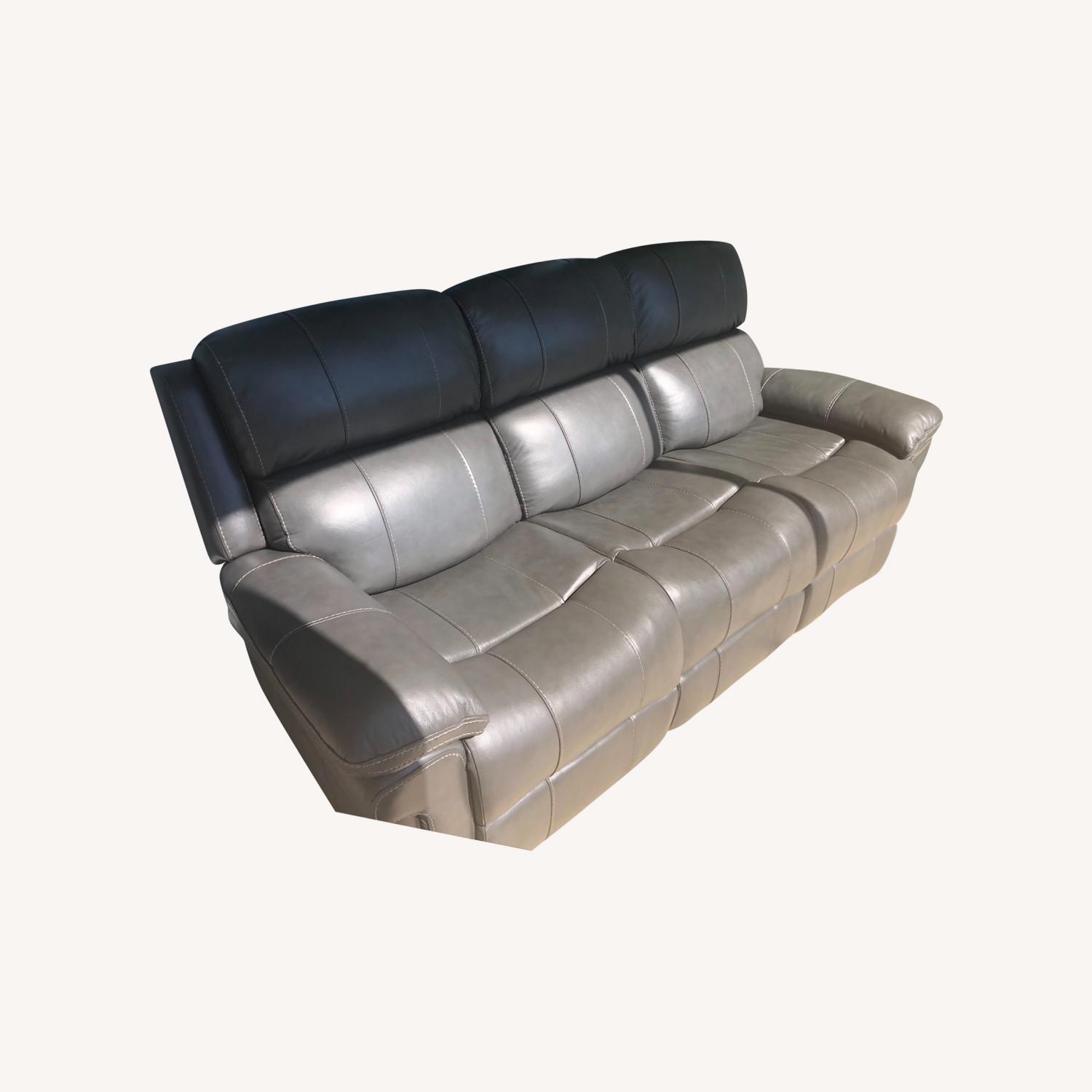 Rooms To Go Faux Leather Non-Power Reclining Sofa - image-0