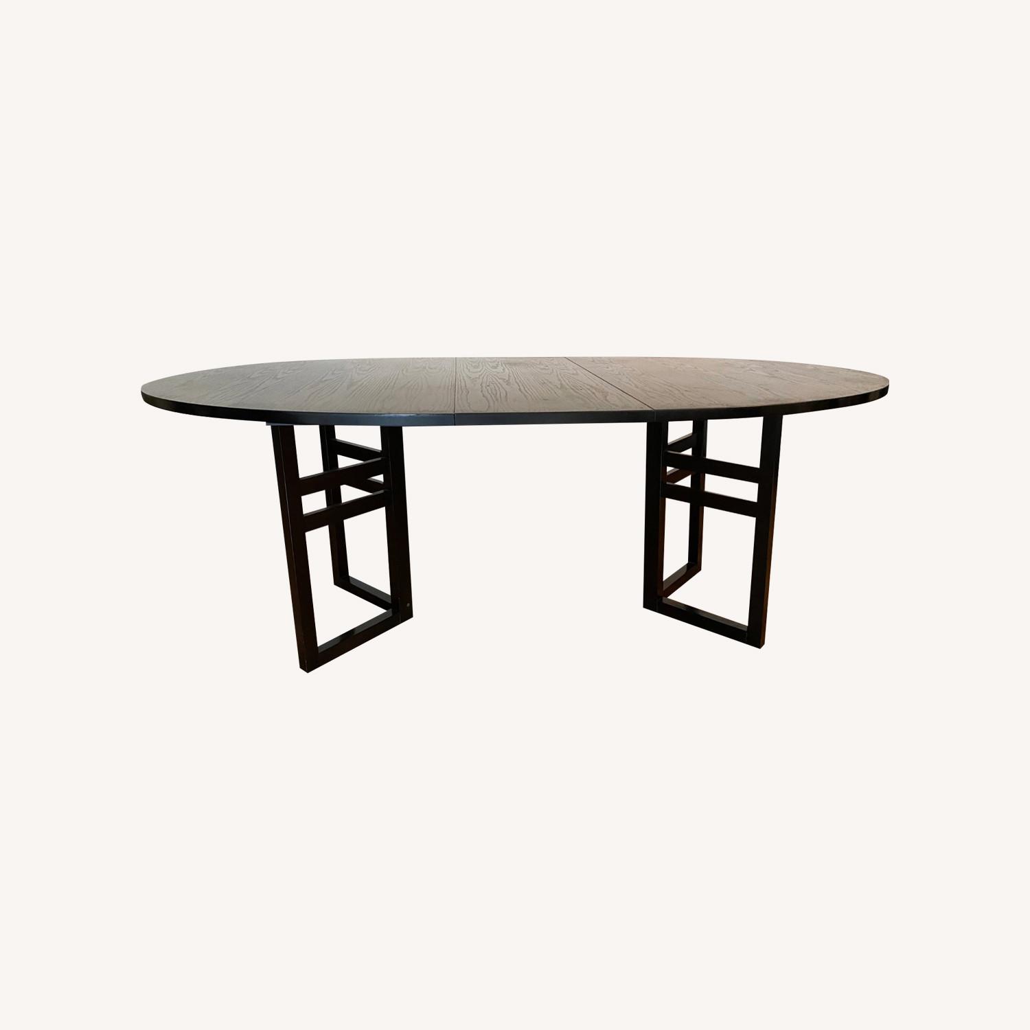 Elegant Expandable Black Wood Dining Table - image-0