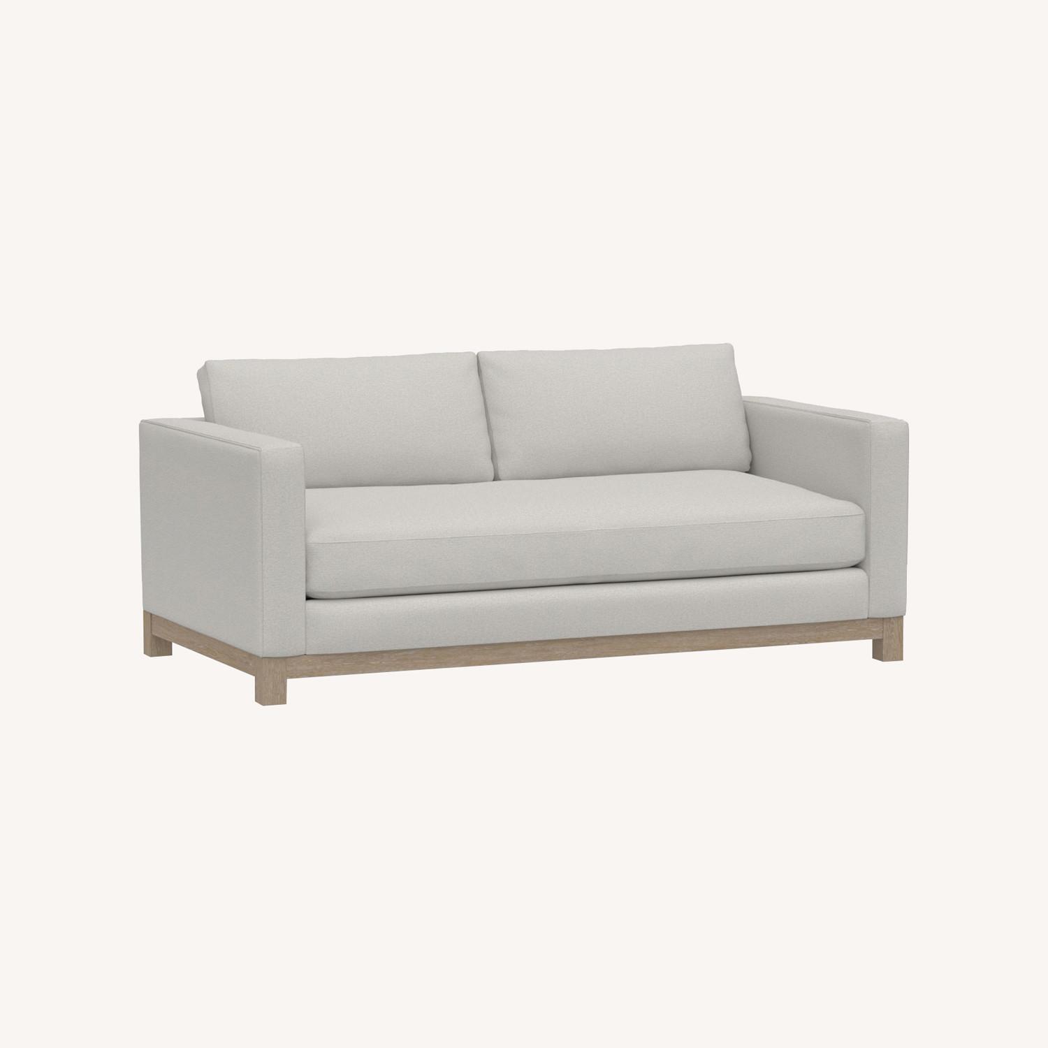 Pottery Barn Jake Sofa with Seadrift Wood Base AptDeco