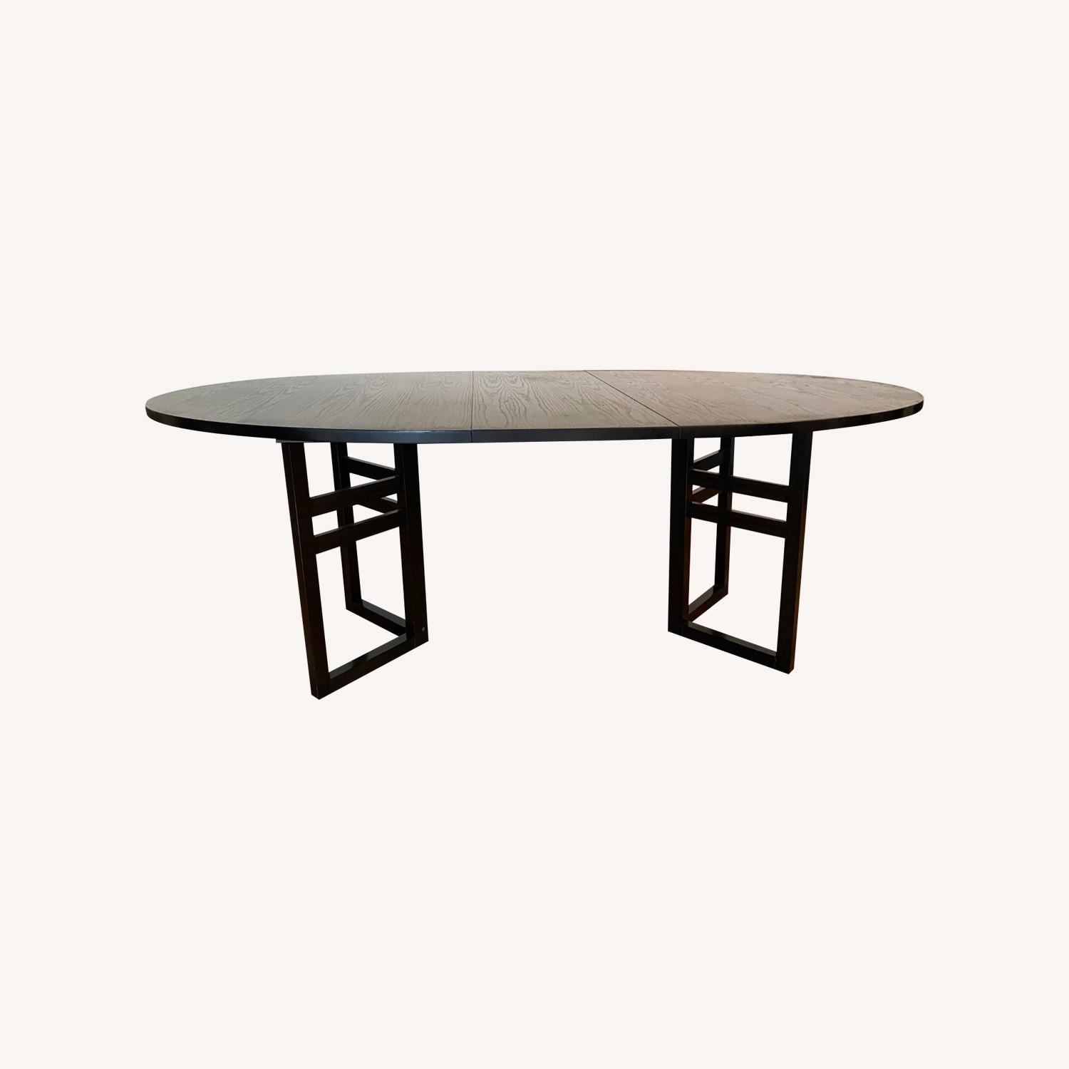 Elegant Expandable Black Wood Dining Table - image-0