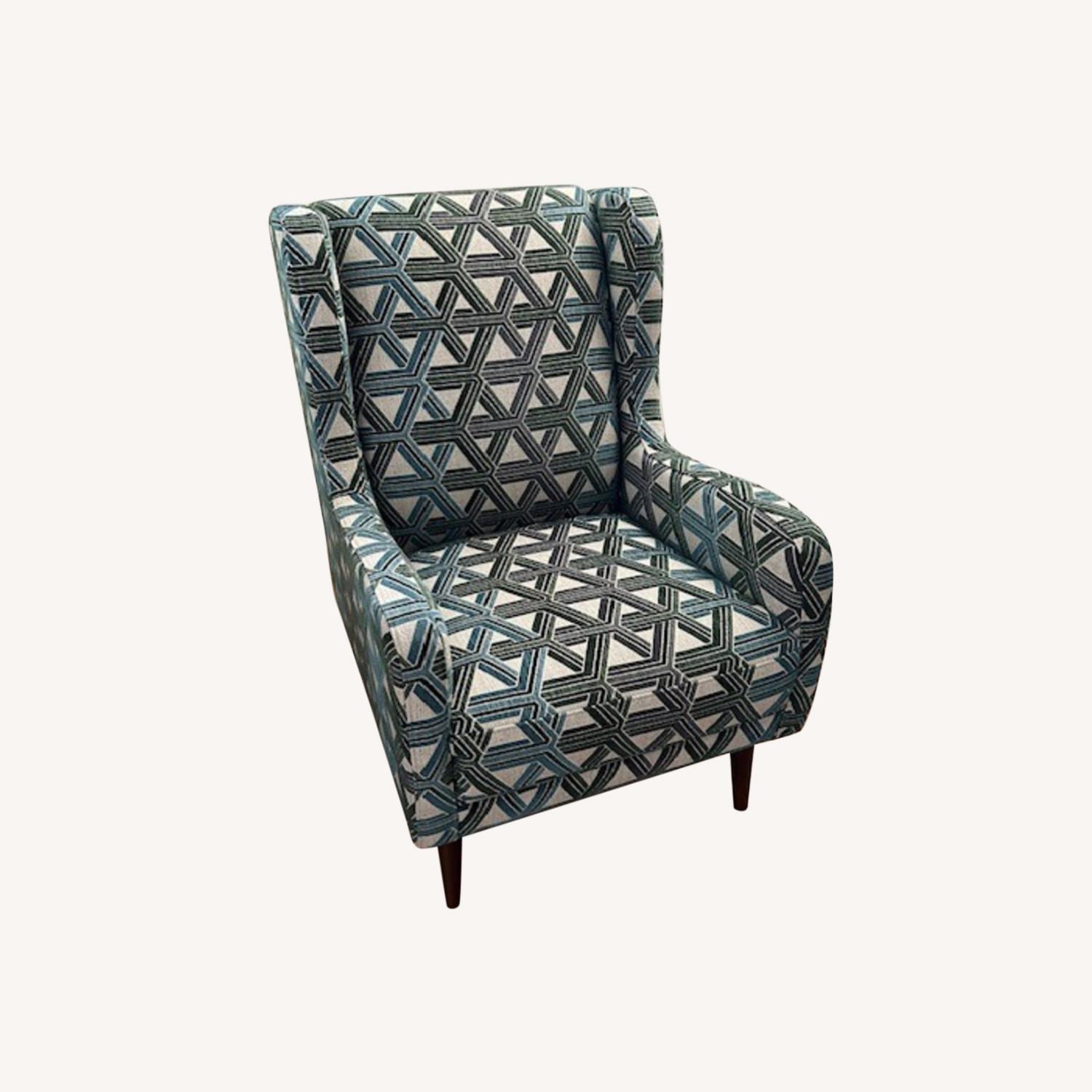 Geometric discount pattern armchair