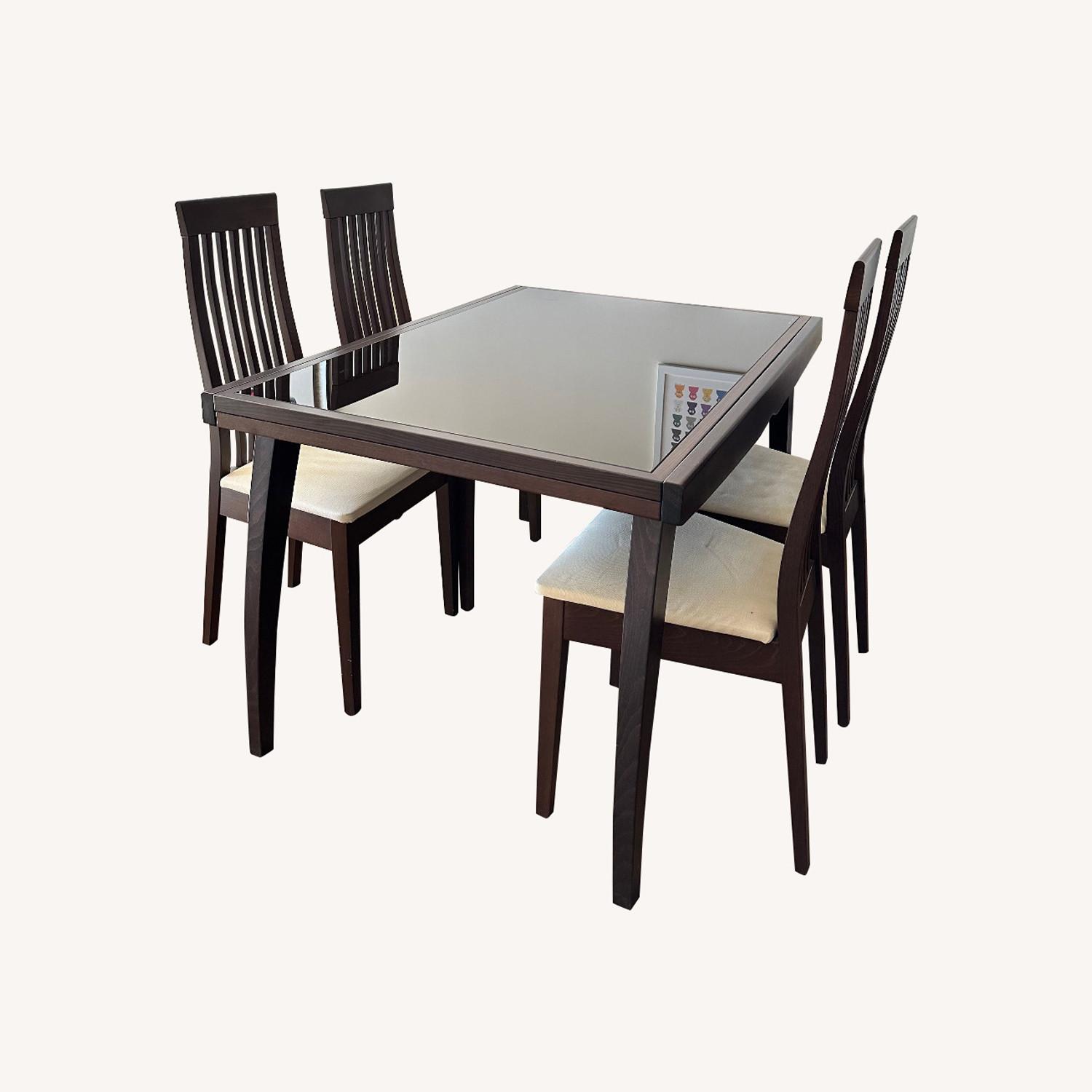 Calligaris Extendable Dining Table Plus 4 Chairs - AptDeco