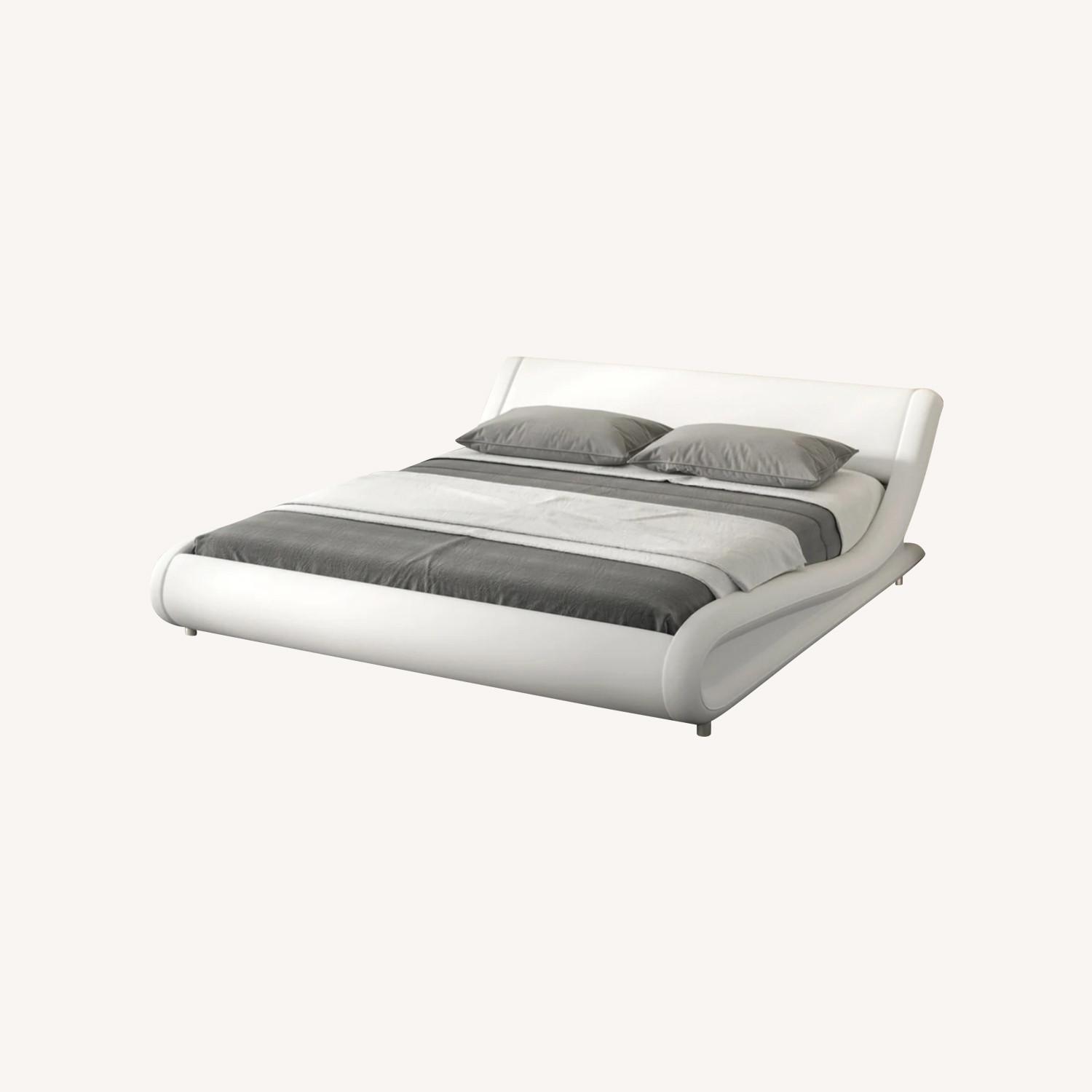 Sha Cerlin King-sized Sleigh Bed - image-0