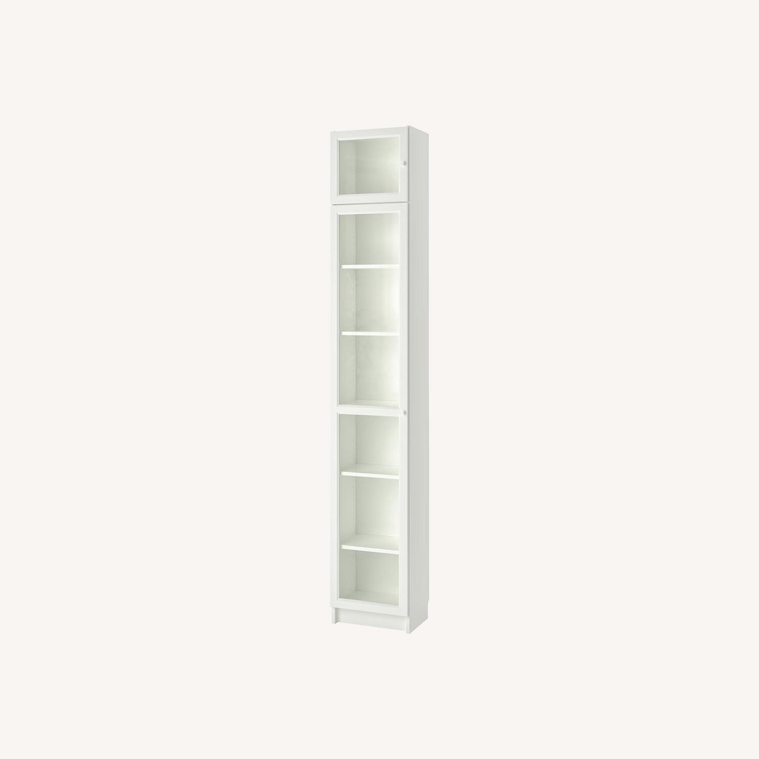 IKEA Bookcase with Glass Door with Extended Shelf - image-0
