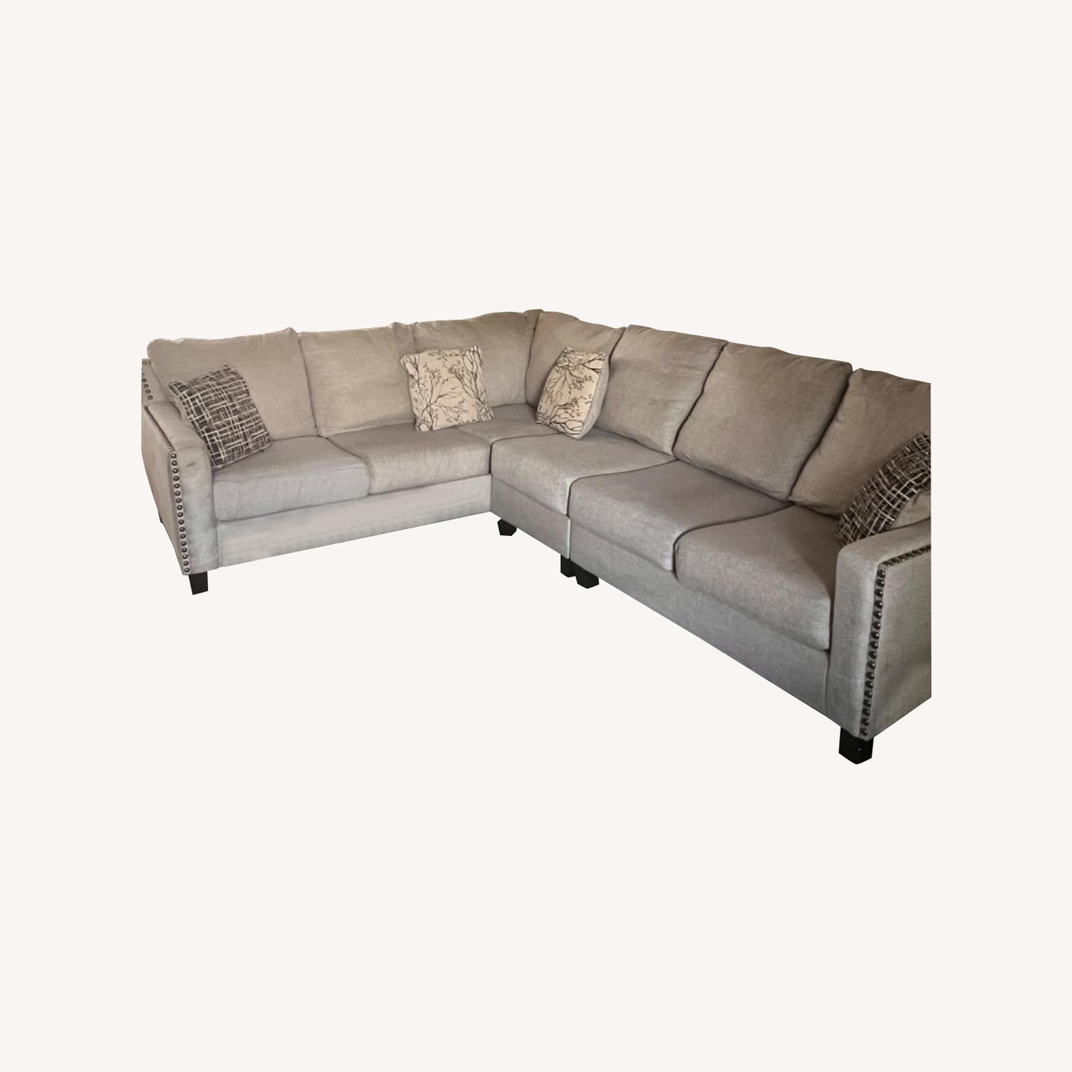 Ashley 3 Piece Grey Fabric Sectional with Large Ottoman - AptDeco