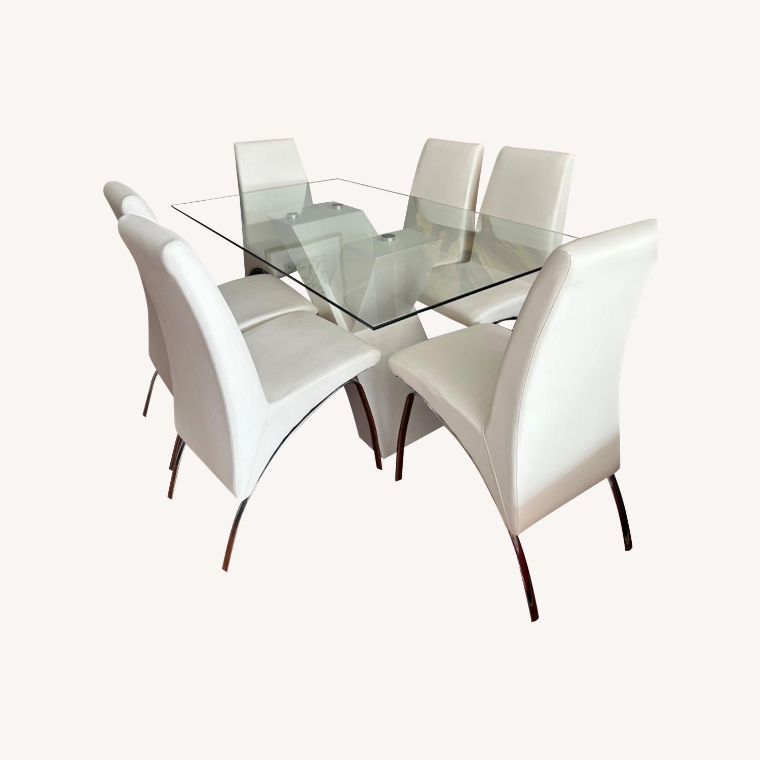 Glass Dining Table with 6 White Leather Chairs - AptDeco