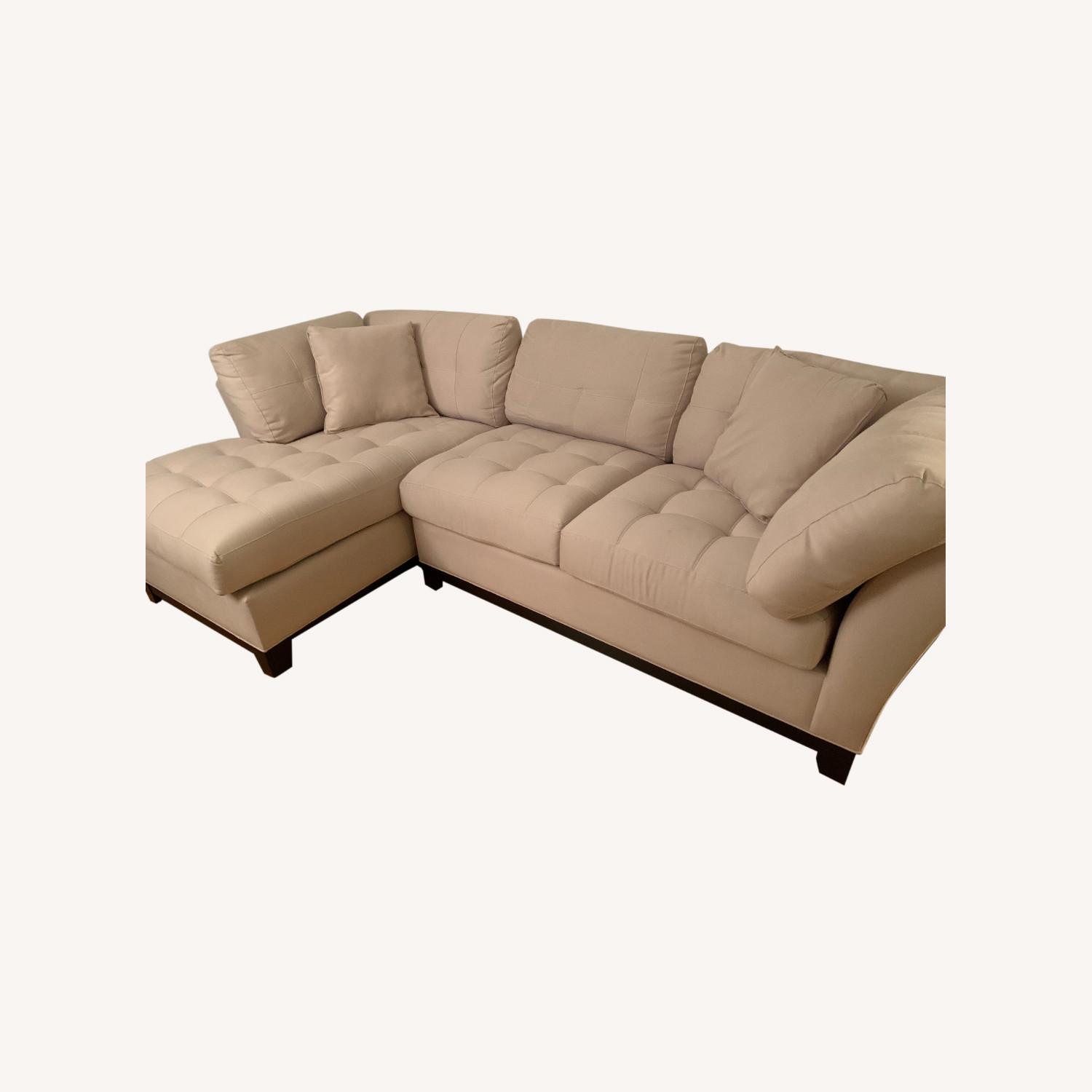 Beige Cream Colored Sectional Couch - image-0