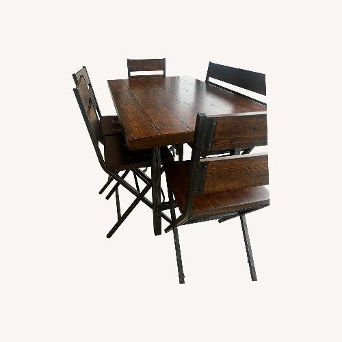 Used Raymour & Flanigan Industrian Dining Set for sale on AptDeco