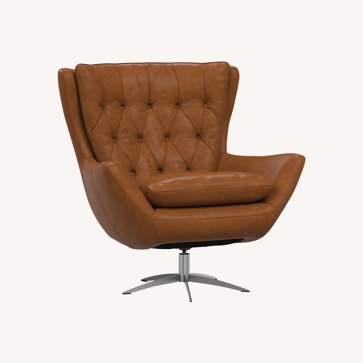 Pottery Barn Wells Tufted Leather Swivel Chair - AptDeco