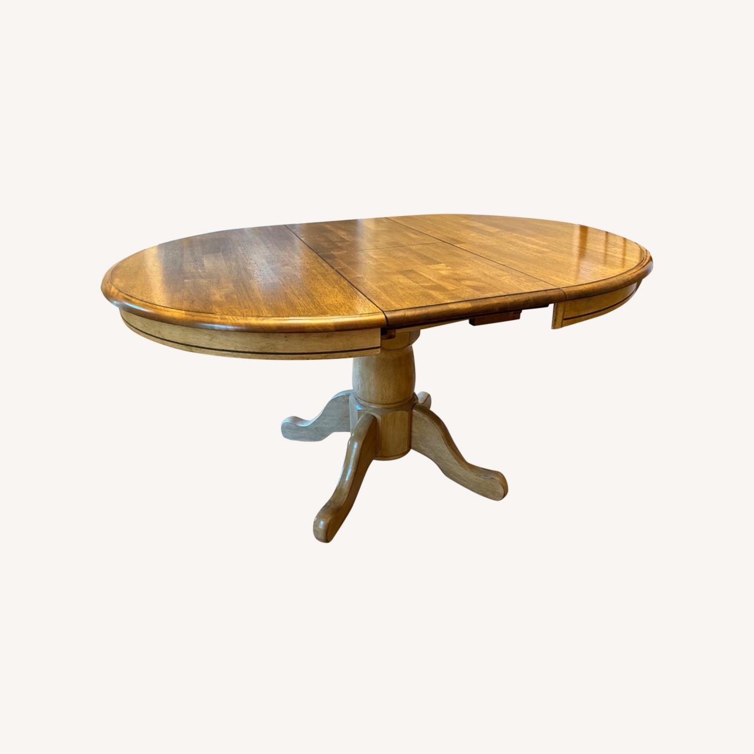42 Round Table Converts to 57 Oval Table - image-0