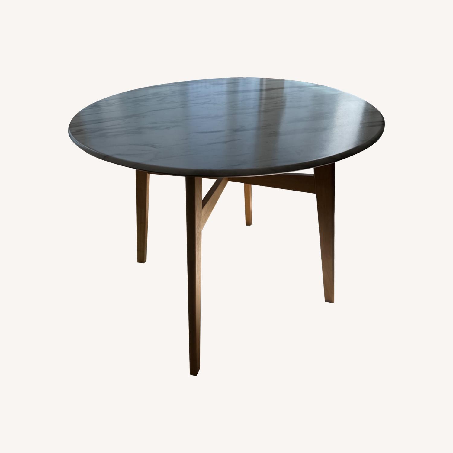 Wade Logan Round Natural Wood Table - AptDeco