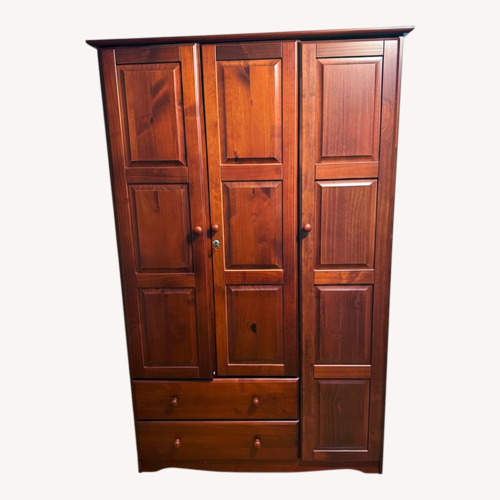 Used Ashley Furniture Dark Brown Wood Armoire for sale on AptDeco