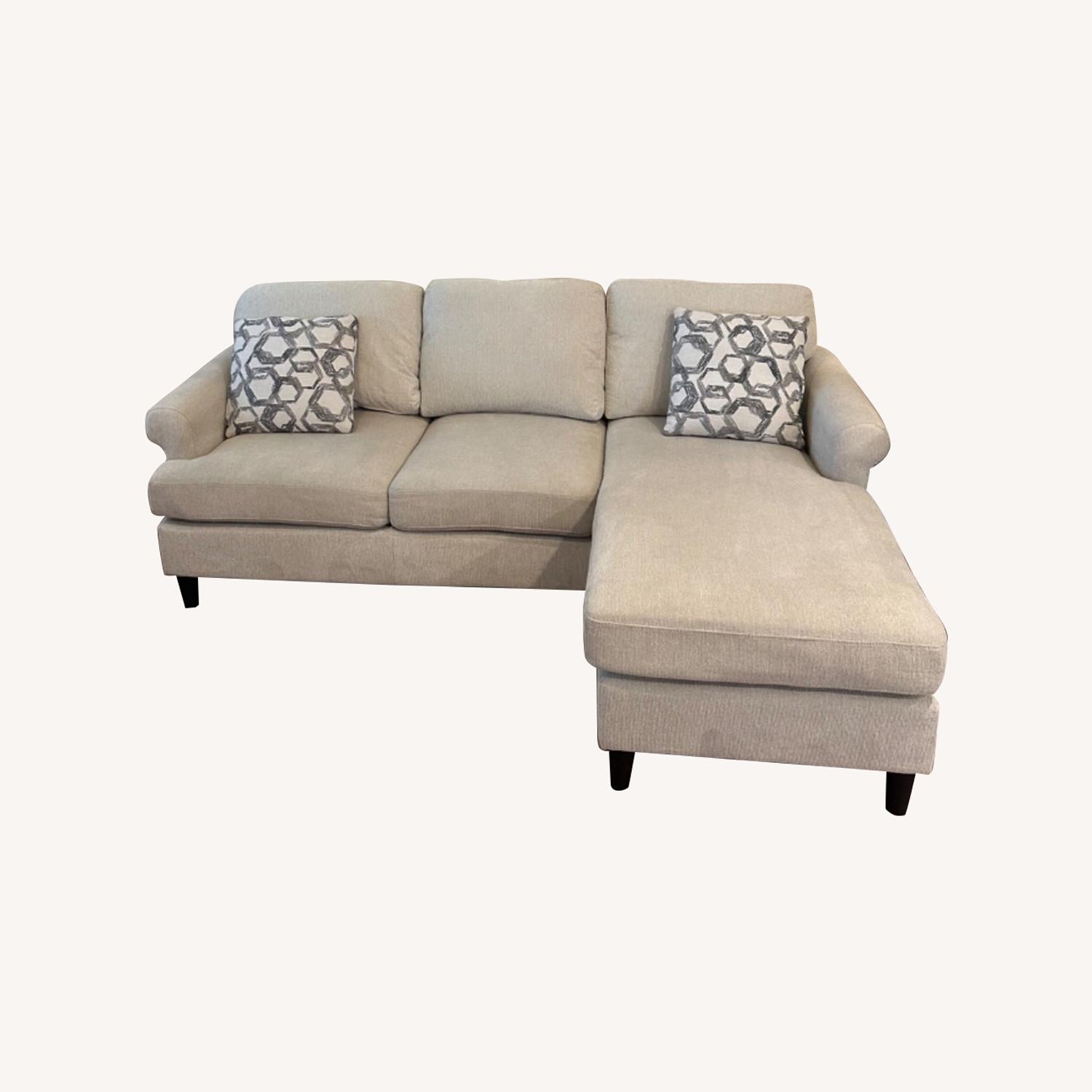 Living Spaces Sectional Sofa - AptDeco