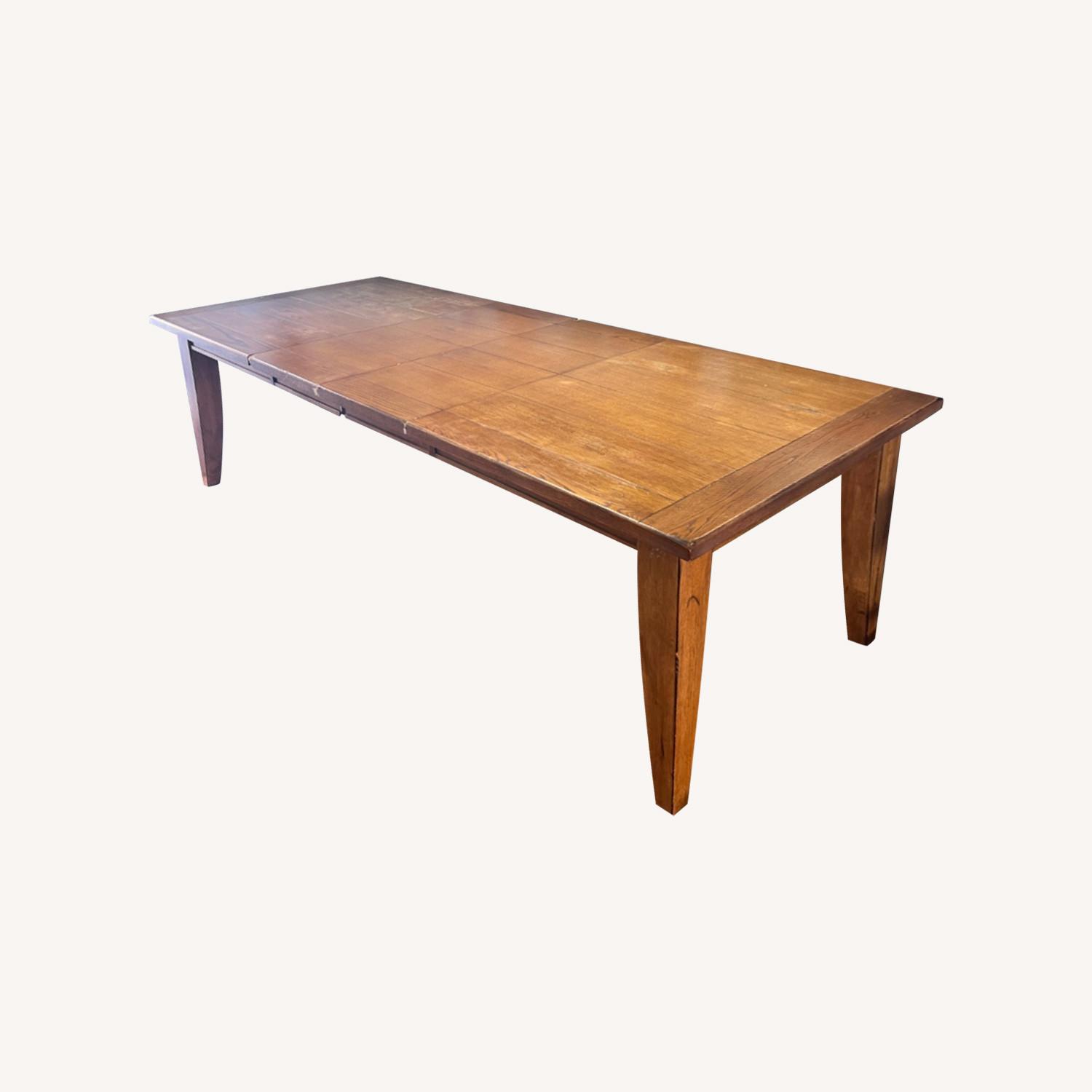 Rustic Oak Extendable Dining Table with 8 Chairs - AptDeco