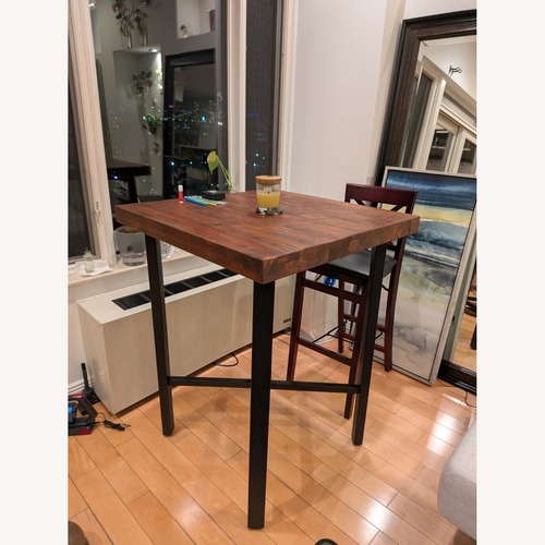 Used Pottery Barn Griffin Square Reclaimed Wood Bar Height Table for sale on AptDeco
