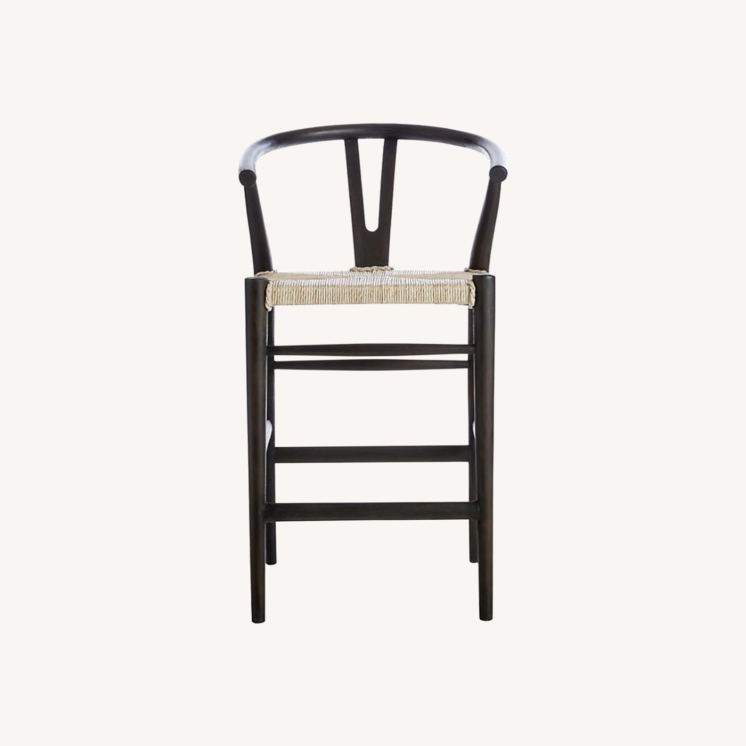 Crate & Barrel Set of Crescent Black Wood Wishbone Counter Stool - image-0