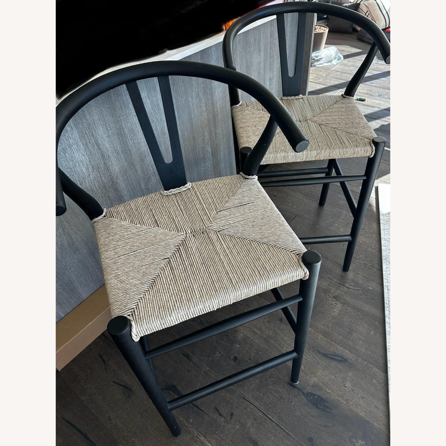 Crate & Barrel Set of Crescent Black Wood Wishbone Counter Stool - image-1