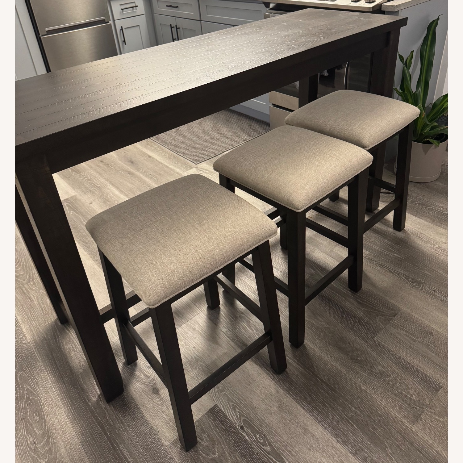 Kitchen Island with 3 Stools - AptDeco