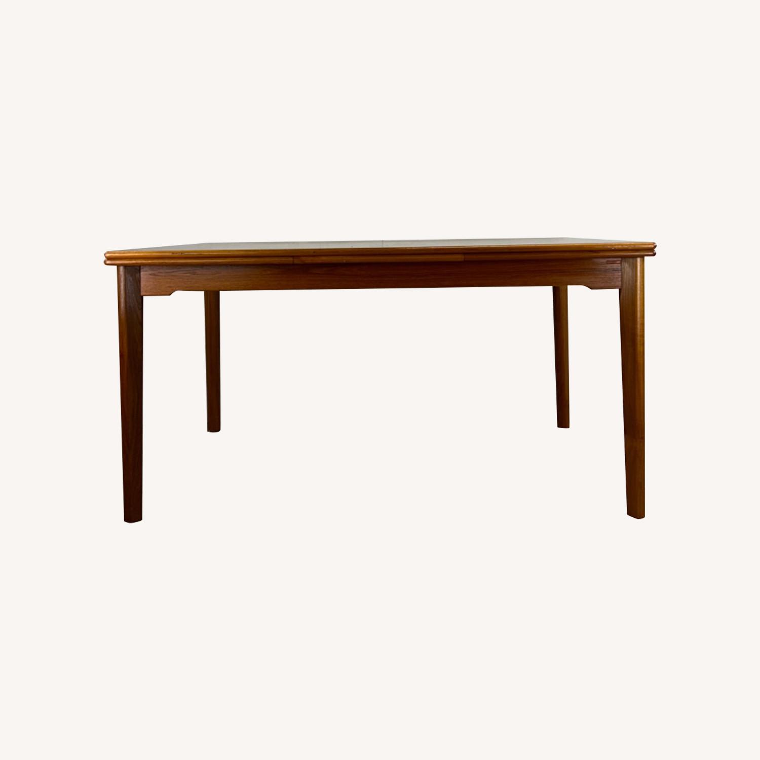 Danish Modern Teak Draw Leaf Dining Table - image-0