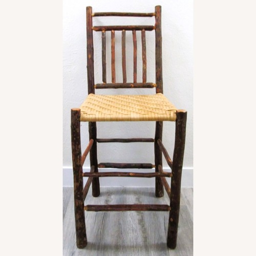Used Primitive Wood with Woven Cane Seat Counter Stool for sale on AptDeco