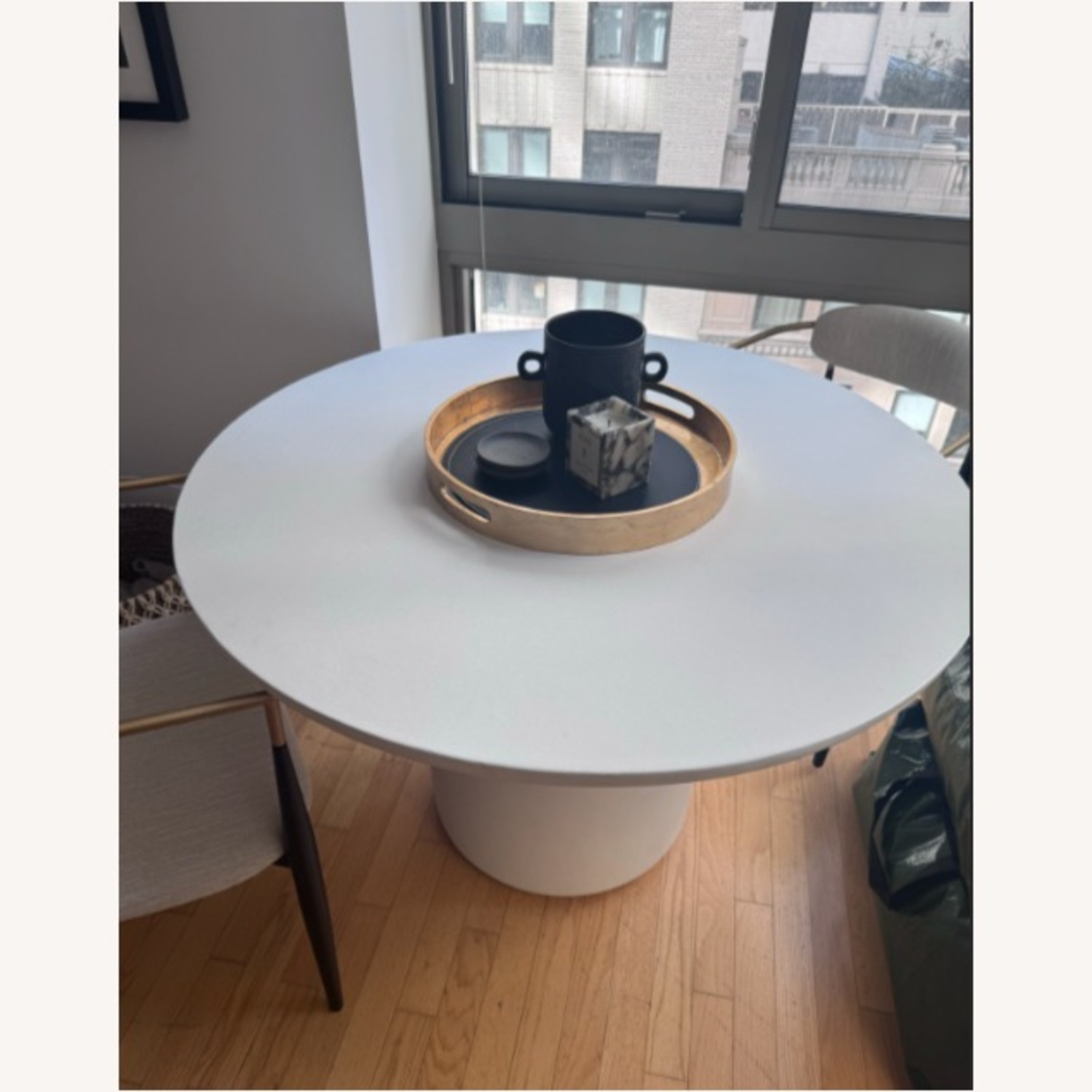 CB2 Lola 45" Round Ivory Concrete Dining Table - image-1