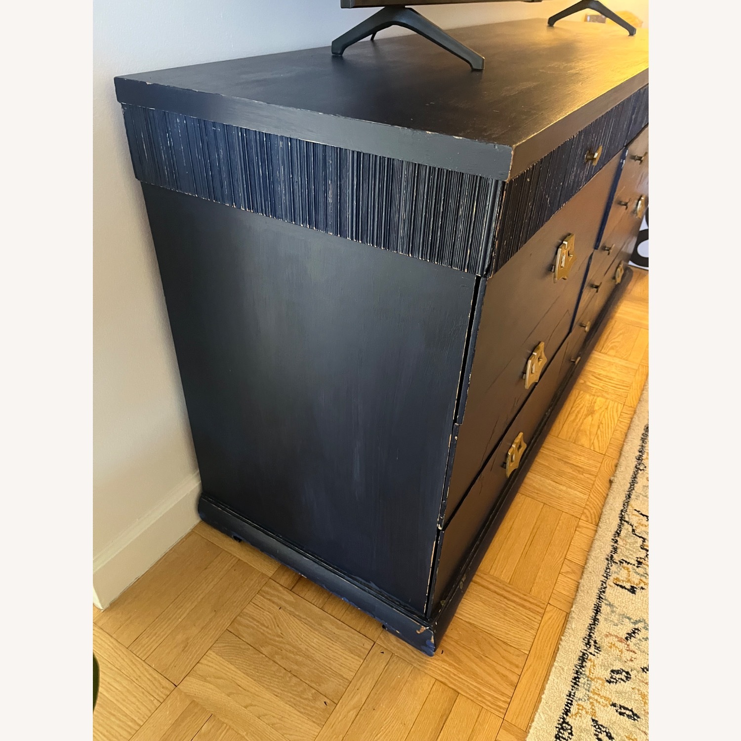 Vintage blue dresser with brass knobs - AptDeco