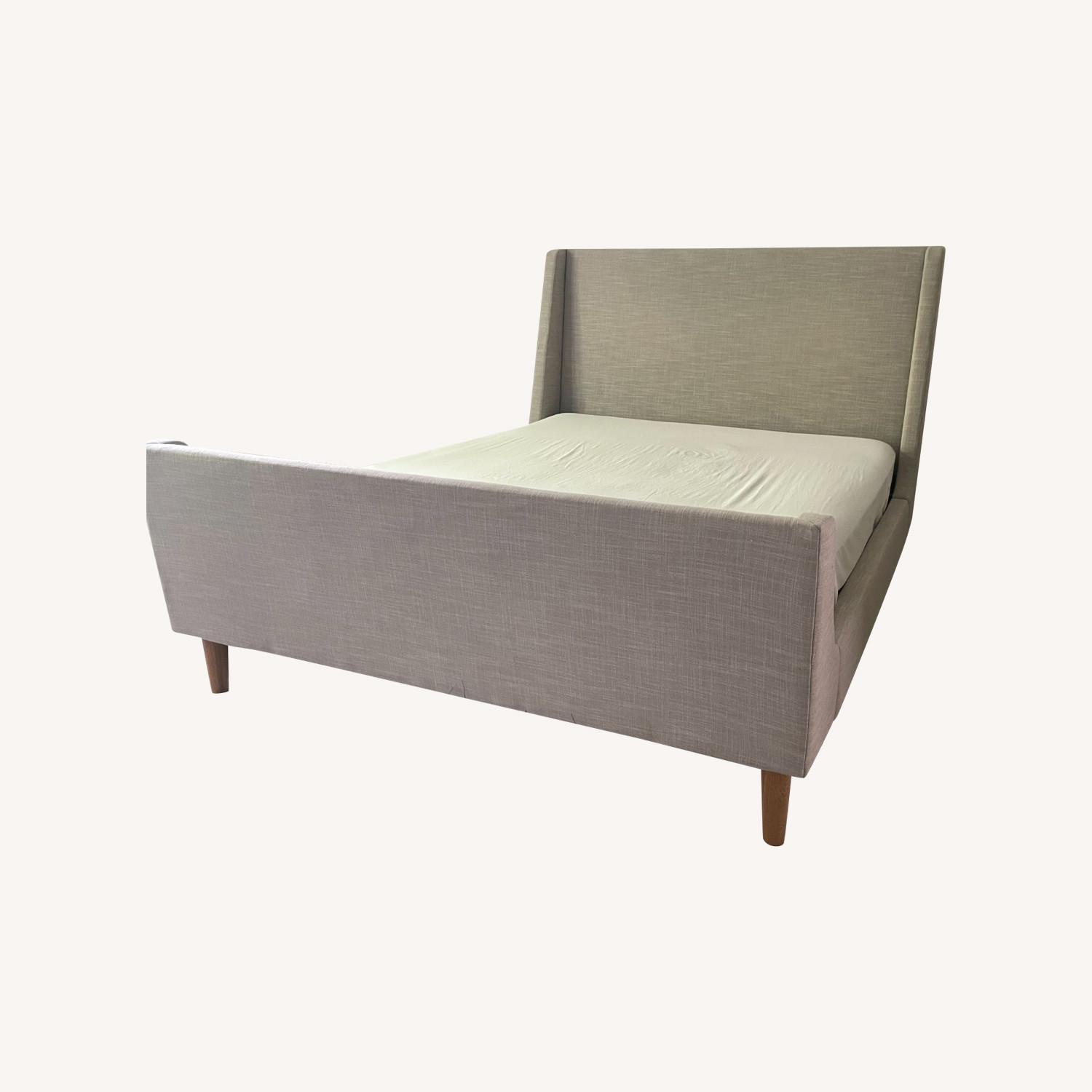 West Elm Upholstered Sleigh Queen Bed - AptDeco