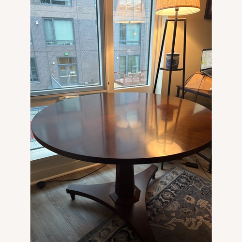 Used Antique Circular Dining Table for sale on AptDeco