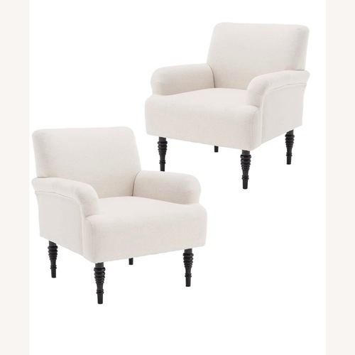 Used 2 White Chairs Wooden Legs  for sale on AptDeco