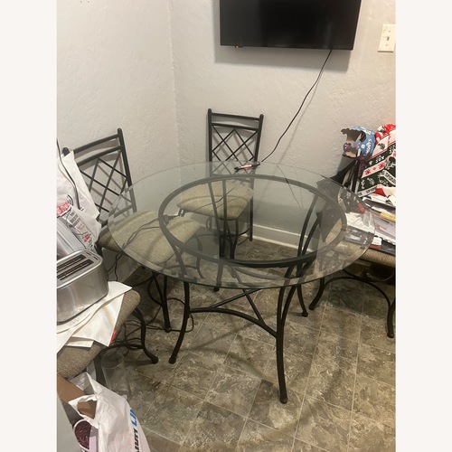 Used Glass Dining Table  for sale on AptDeco