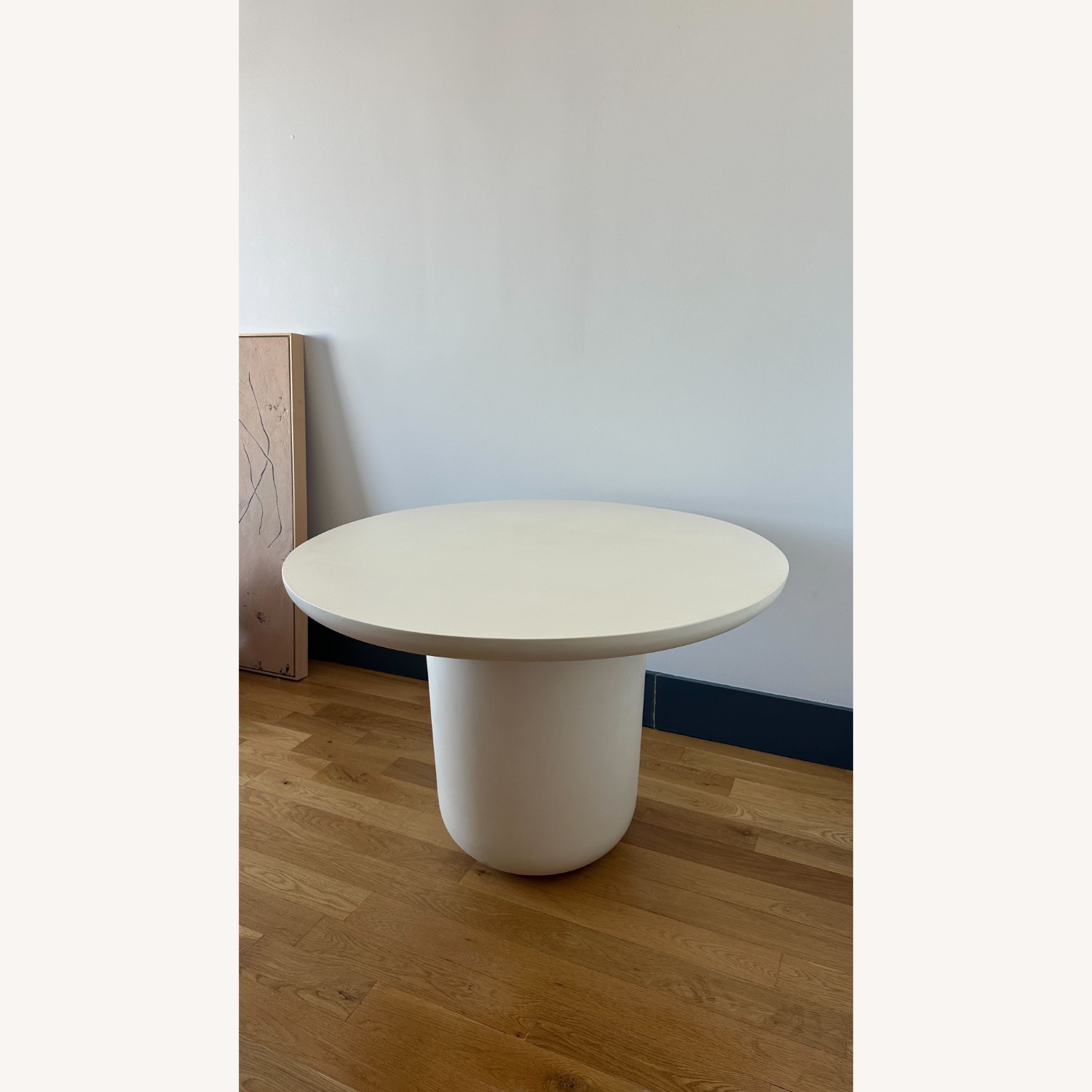 CB2 Lola 45" Round Ivory Concrete Dining Table - image-1