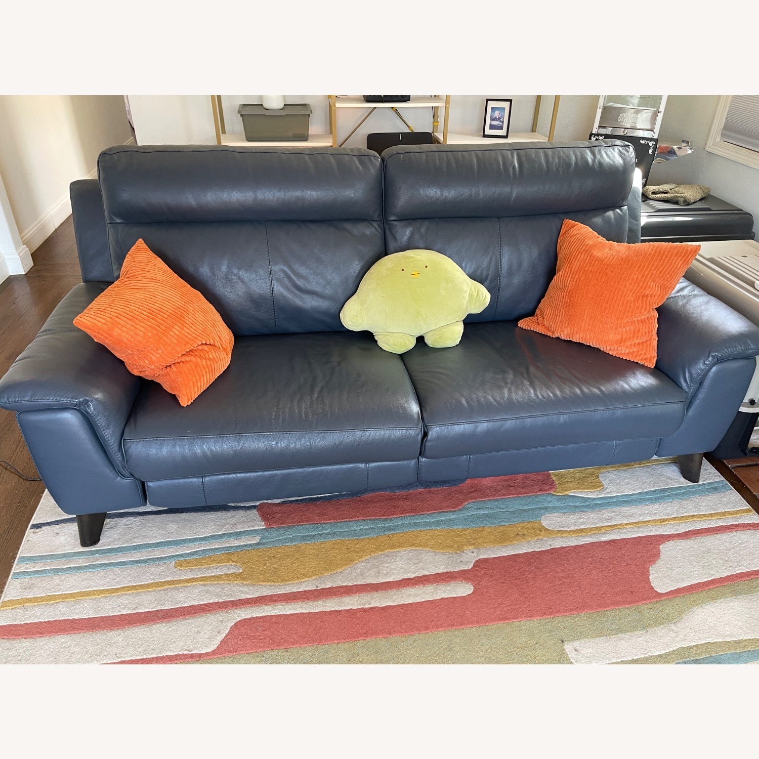 Living Spaces Blue Leather Reclining Sofa  - image-1