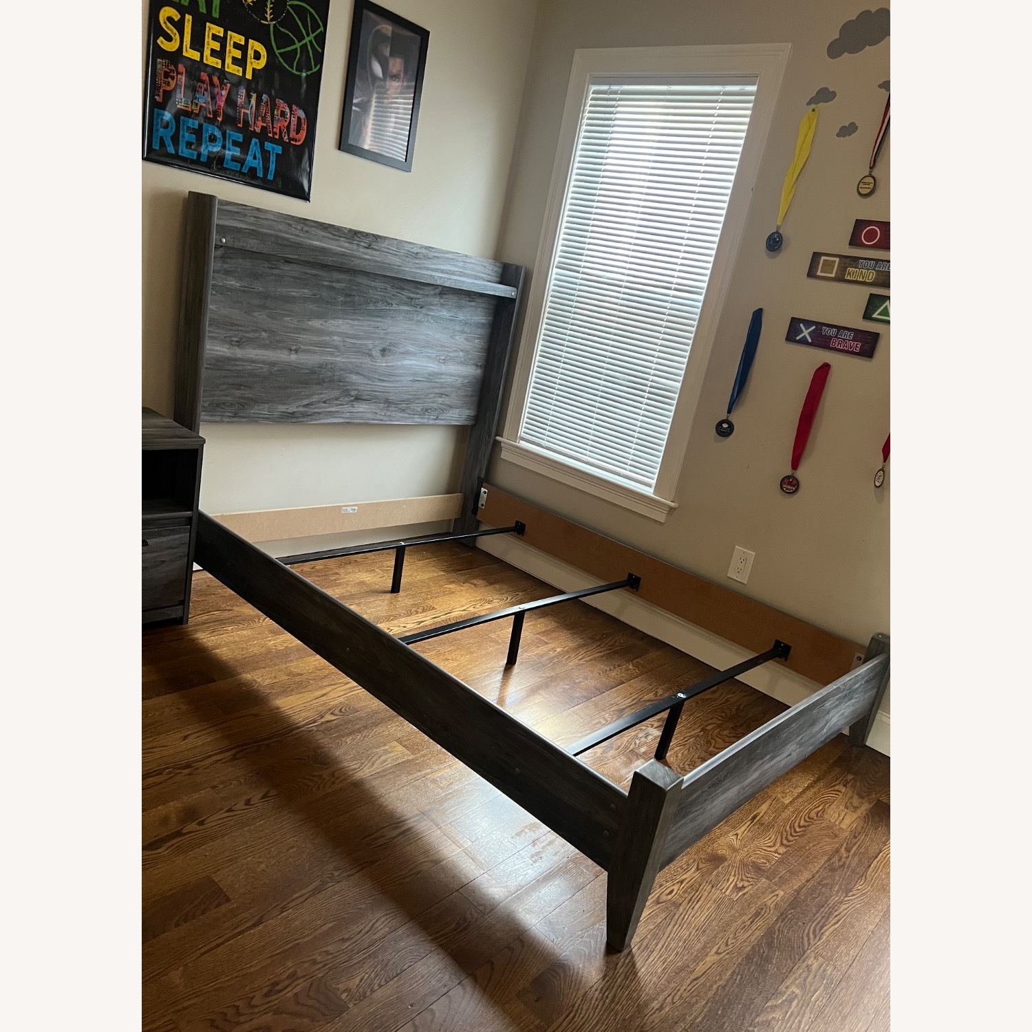 Ashley Furniture Gray Wood Panel Bed with Nightstand - image-0