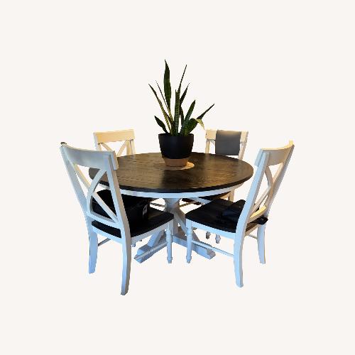 Used Raymour & Flanigan 54” Round Distressed Farmhouse Table & Chairs for sale on AptDeco