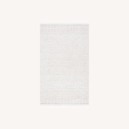 Used Handmade Ivory Area Rug 4X6 for sale on AptDeco