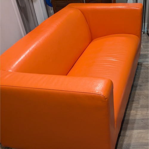 Used IKEA Faux Leather Orange Sofa with Olive Cover for sale on AptDeco