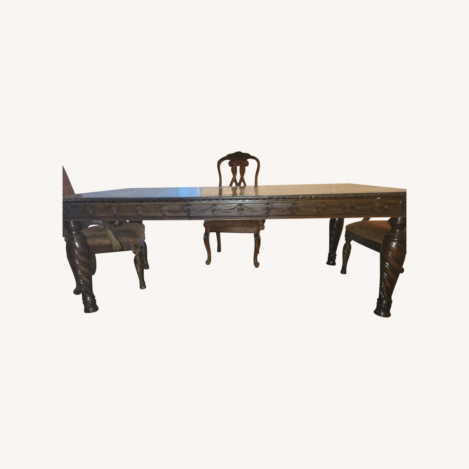 Wood Dining Table and 3 Chairs - image-0
