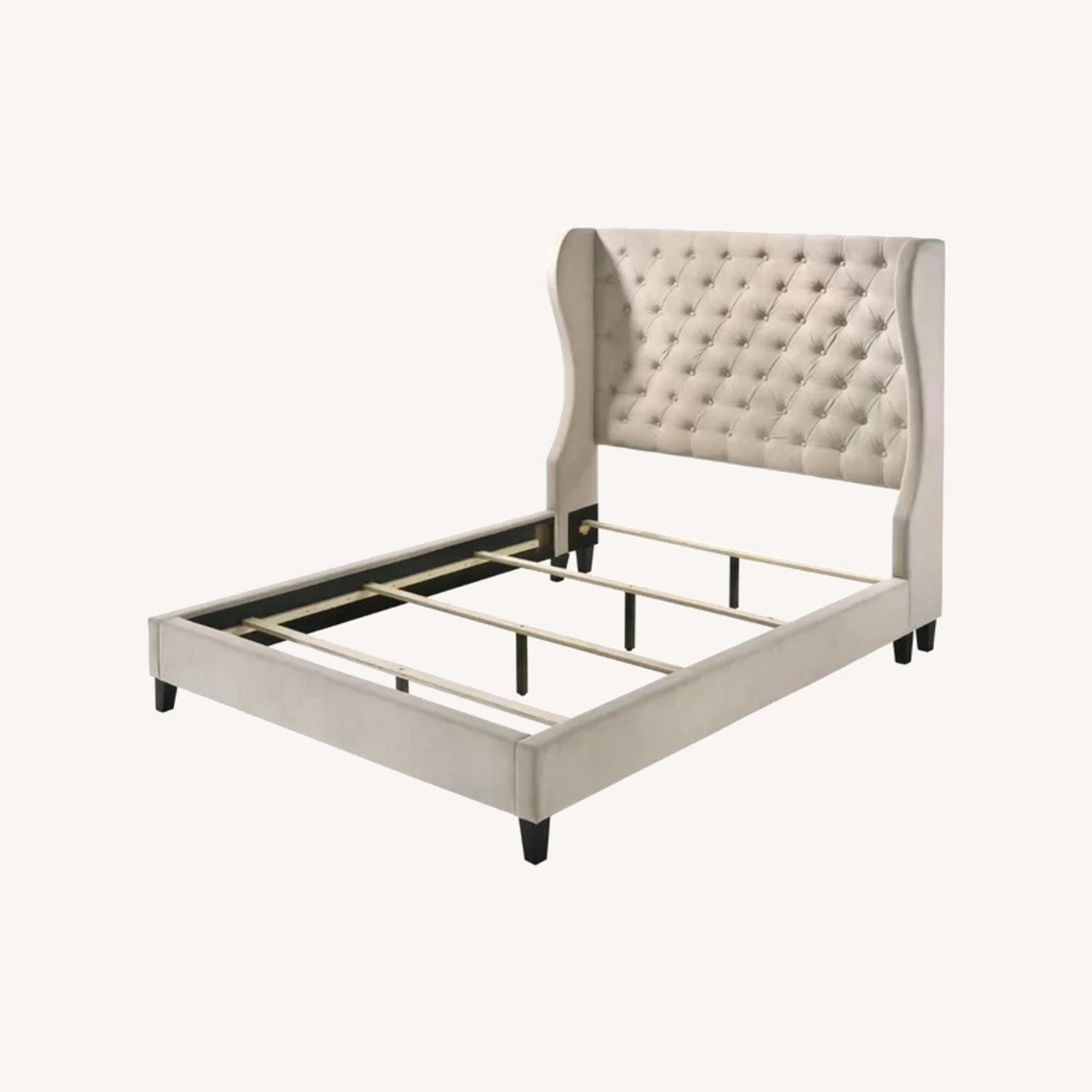 Winfree Upholstered Wingback Bed - image-0