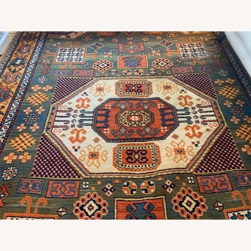 Used Trendy Green, Gold & Orange Rug for sale on AptDeco