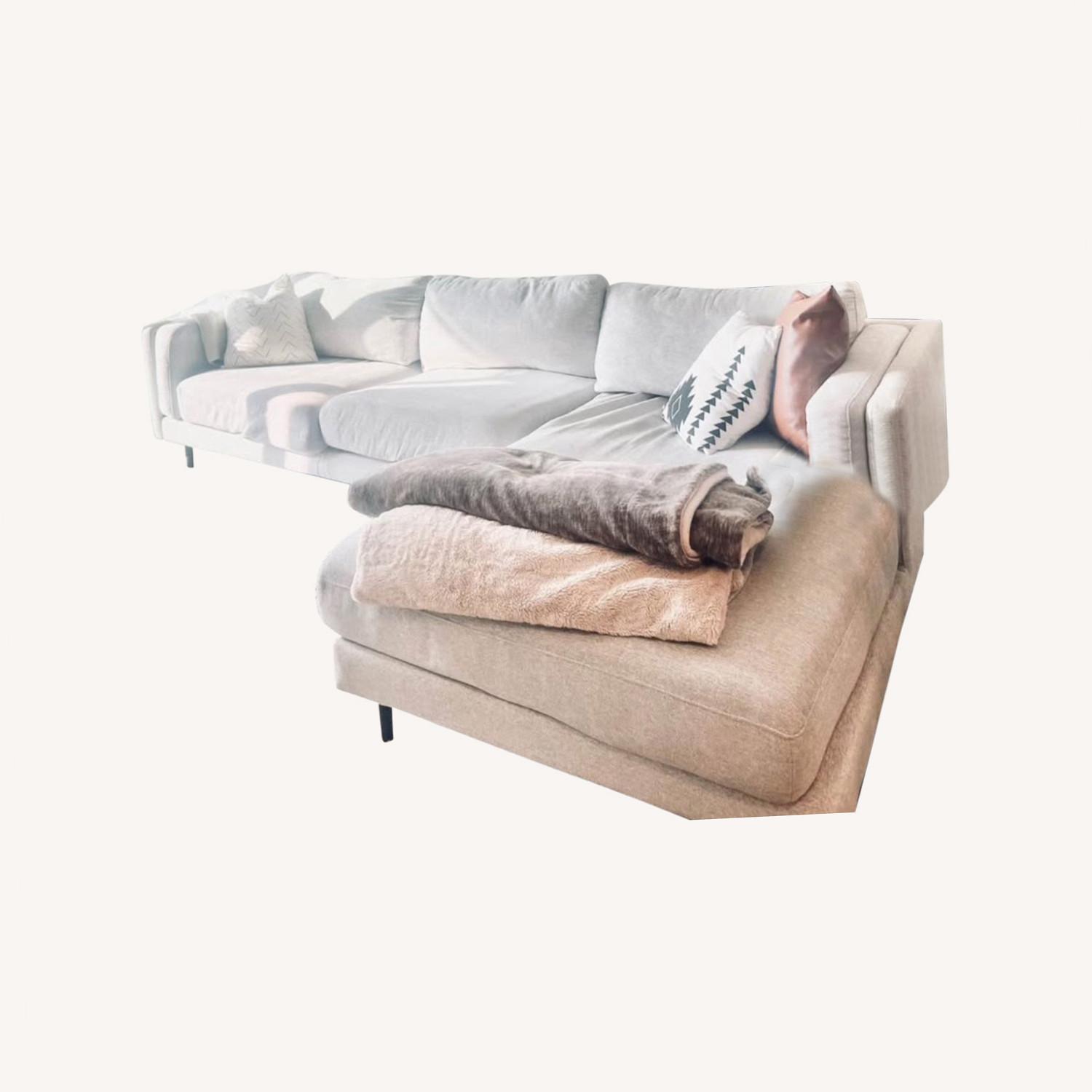 Living Spaces Sectional Sofa - image-0