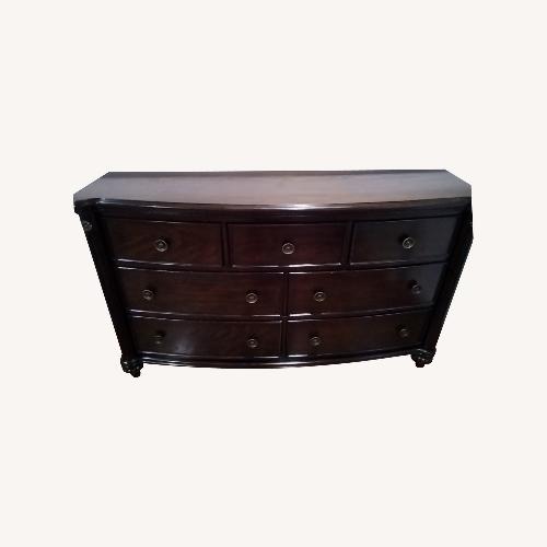 Used Regency Cherry 7 Drawer Dresser for sale on AptDeco