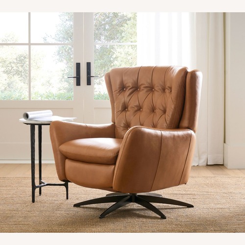 Used Pottery Barn Wells Tufted Leather Swivel Recliner for sale on AptDeco