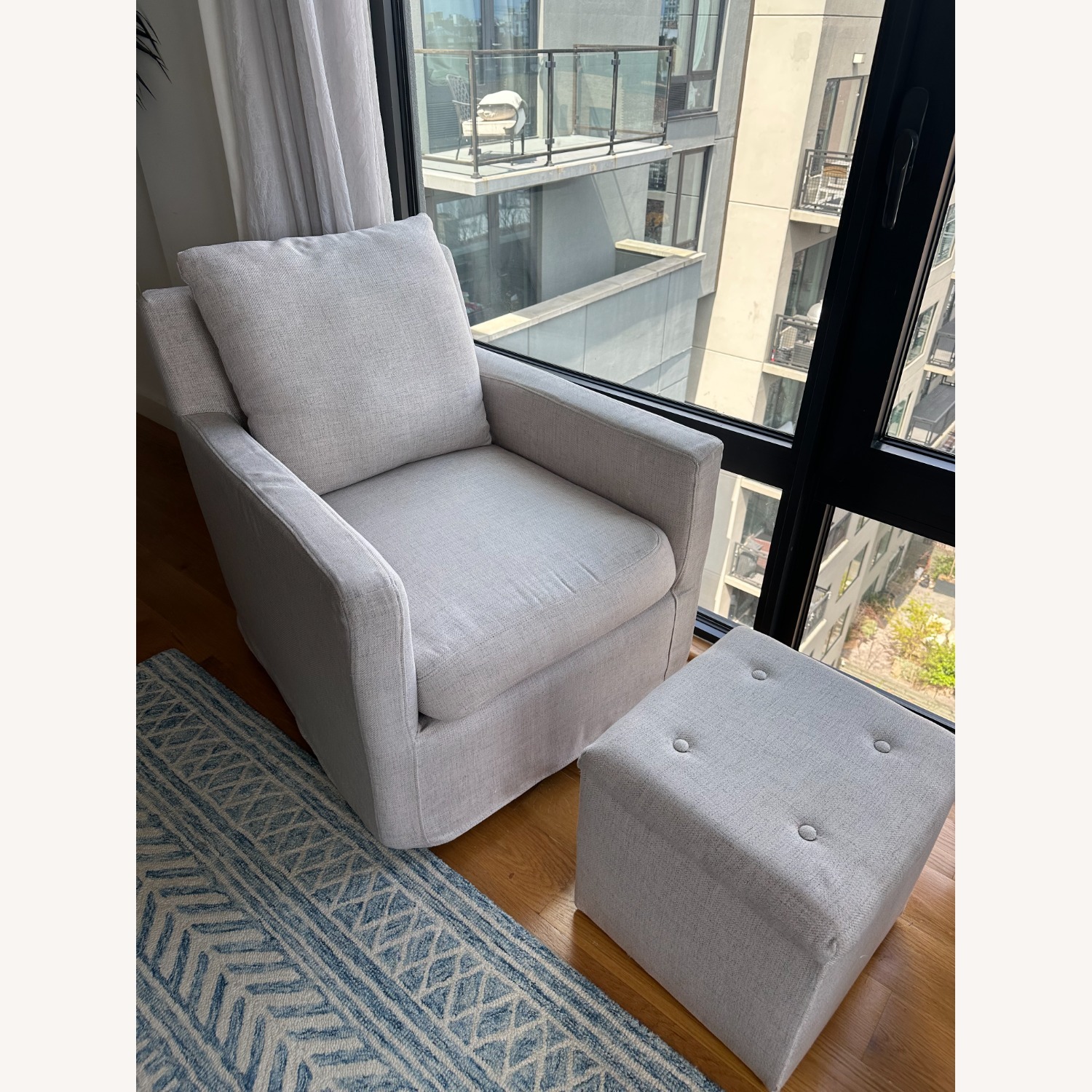 Pottery Barn Swivel Glider w/Ottoman - image-1