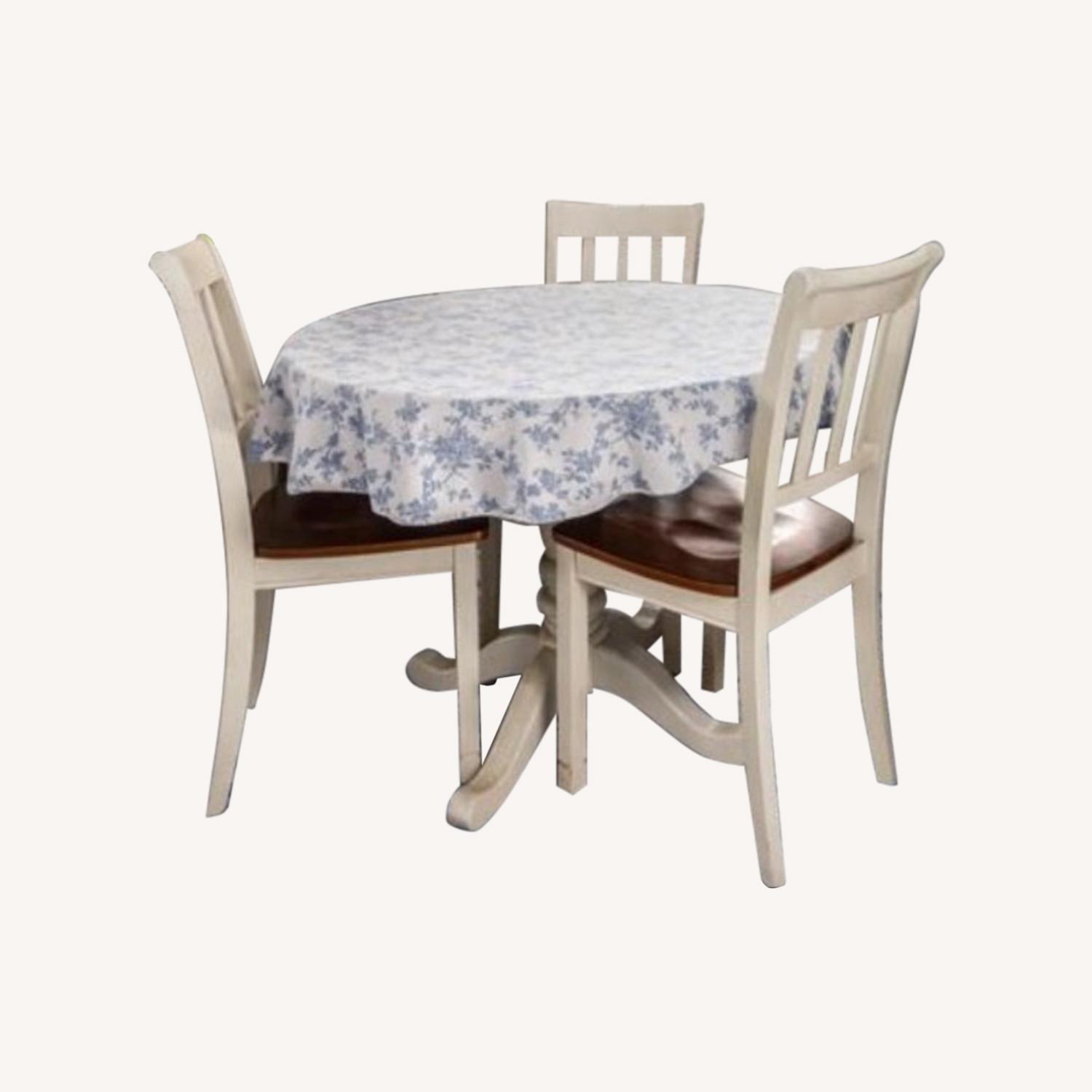 Ashley Furniture Dining Table with 3 Chairs - image-0